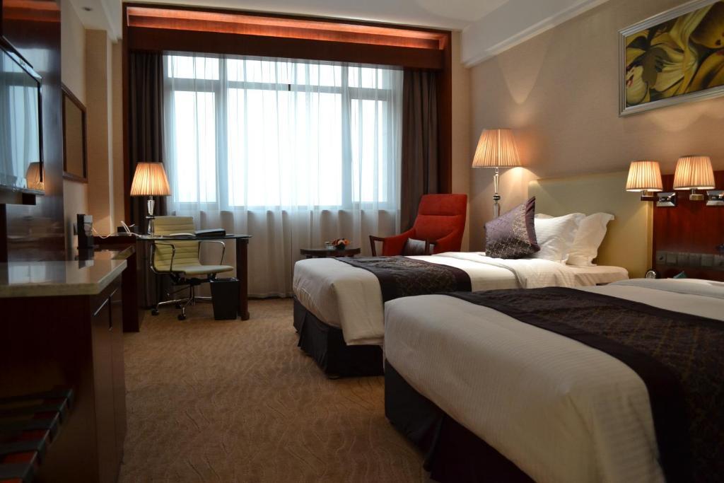 Wuhan Tianchimel Hotel Rom bilde