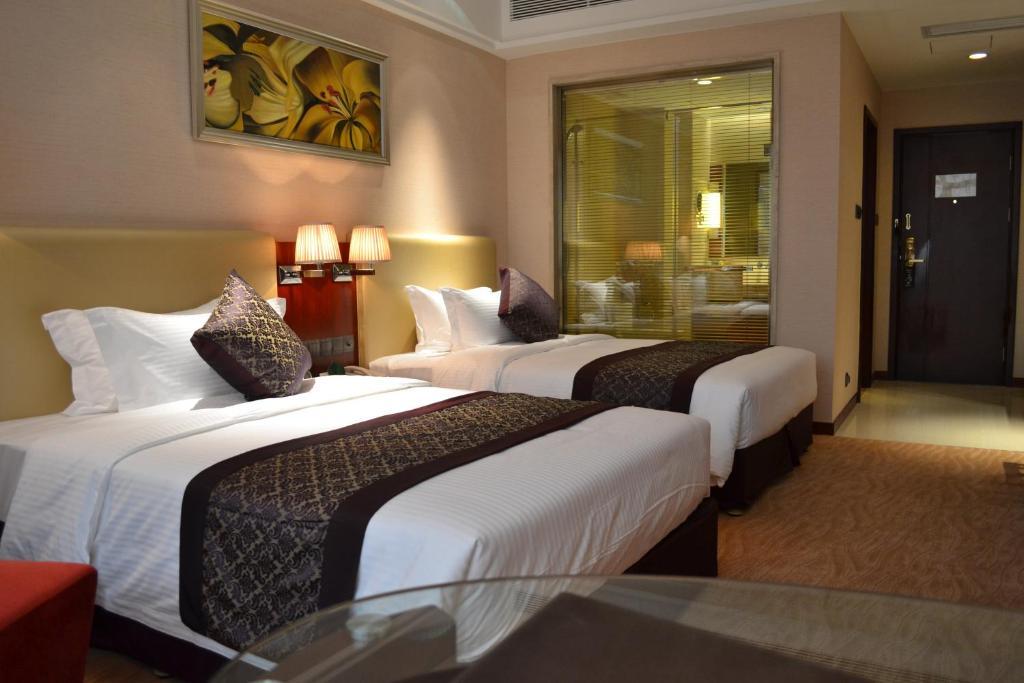 Wuhan Tianchimel Hotel Rom bilde