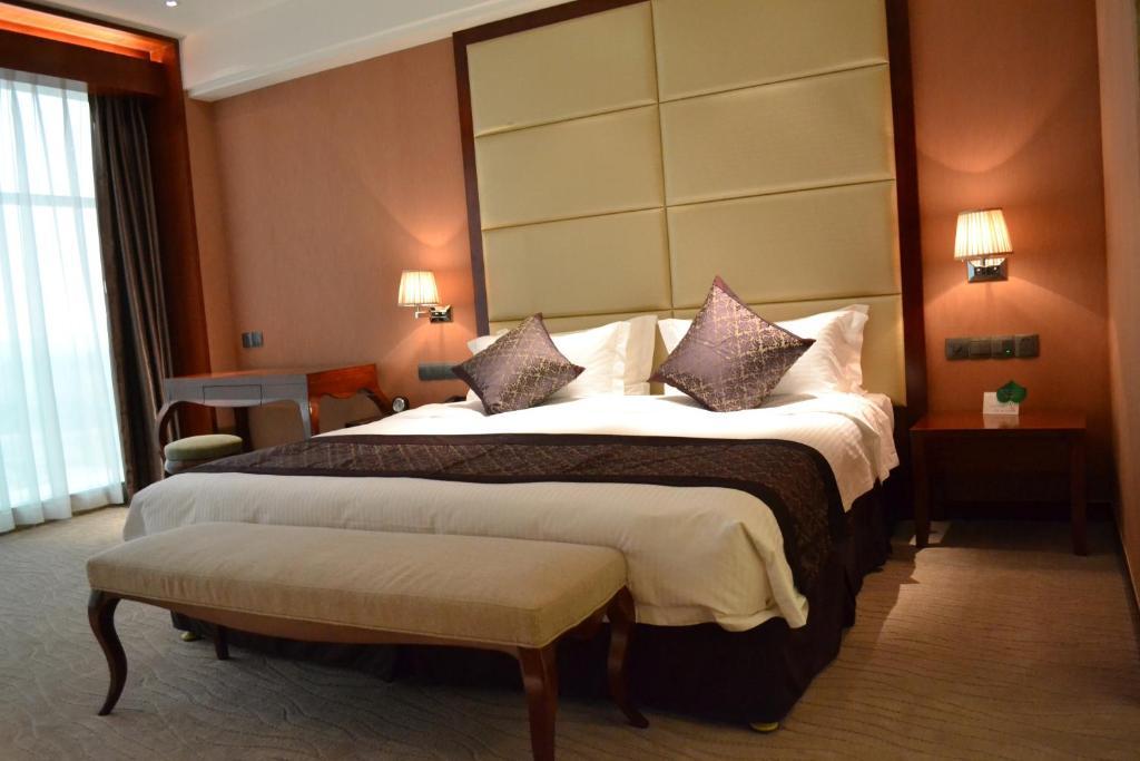Wuhan Tianchimel Hotel Rom bilde